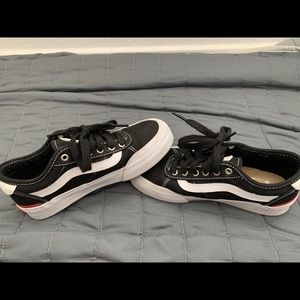 Black and white youth Vans